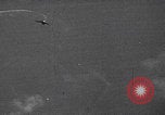 Image of Japanese planes and ships strafed in Leyte WWII Philippines, 1944, second 13 stock footage video 65675079909