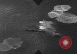 Image of Japanese planes and ships strafed in Leyte WWII Philippines, 1944, second 15 stock footage video 65675079909
