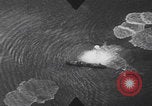 Image of Japanese planes and ships strafed in Leyte WWII Philippines, 1944, second 16 stock footage video 65675079909
