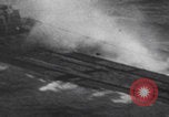 Image of Japanese planes and ships strafed in Leyte WWII Philippines, 1944, second 23 stock footage video 65675079909