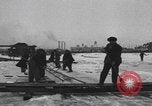 Image of Ice block harvesting in Detroit Detroit Michigan USA, 1921, second 3 stock footage video 65675079954