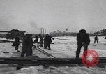 Image of Ice block harvesting in Detroit Detroit Michigan USA, 1921, second 6 stock footage video 65675079954
