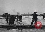 Image of Ice block harvesting in Detroit Detroit Michigan USA, 1921, second 7 stock footage video 65675079954
