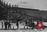 Image of Ice block harvesting in Detroit Detroit Michigan USA, 1921, second 23 stock footage video 65675079954
