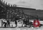 Image of Ice block harvesting in Detroit Detroit Michigan USA, 1921, second 25 stock footage video 65675079954