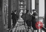 Image of Ice block harvesting in Detroit Detroit Michigan USA, 1921, second 45 stock footage video 65675079954