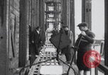 Image of Ice block harvesting in Detroit Detroit Michigan USA, 1921, second 50 stock footage video 65675079954