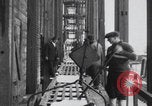 Image of Ice block harvesting in Detroit Detroit Michigan USA, 1921, second 53 stock footage video 65675079954