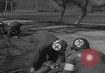 Image of United States medics aid wounded WW2 Germany, 1945, second 45 stock footage video 65675079995