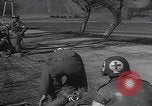 Image of United States medics aid wounded WW2 Germany, 1945, second 48 stock footage video 65675079995