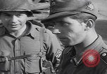 Image of 88th Infantry troops question POWs Zerf Germany, 1945, second 61 stock footage video 65675079997