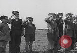 Image of Boys salute 101st Airborne Mourmelon le Grand France, 1945, second 4 stock footage video 65675080001