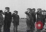 Image of Boys salute 101st Airborne Mourmelon le Grand France, 1945, second 5 stock footage video 65675080001