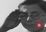 Image of Boys salute 101st Airborne Mourmelon le Grand France, 1945, second 11 stock footage video 65675080001