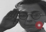 Image of Boys salute 101st Airborne Mourmelon le Grand France, 1945, second 12 stock footage video 65675080001