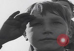 Image of Boys salute 101st Airborne Mourmelon le Grand France, 1945, second 14 stock footage video 65675080001