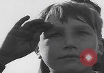 Image of Boys salute 101st Airborne Mourmelon le Grand France, 1945, second 15 stock footage video 65675080001