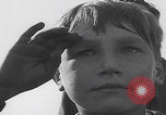 Image of Boys salute 101st Airborne Mourmelon le Grand France, 1945, second 16 stock footage video 65675080001