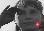 Image of Boys salute 101st Airborne Mourmelon le Grand France, 1945, second 18 stock footage video 65675080001