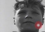 Image of Boys salute 101st Airborne Mourmelon le Grand France, 1945, second 19 stock footage video 65675080001