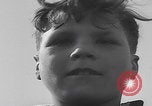 Image of Boys salute 101st Airborne Mourmelon le Grand France, 1945, second 21 stock footage video 65675080001