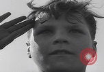 Image of Boys salute 101st Airborne Mourmelon le Grand France, 1945, second 23 stock footage video 65675080001
