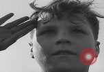 Image of Boys salute 101st Airborne Mourmelon le Grand France, 1945, second 24 stock footage video 65675080001
