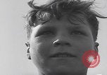 Image of Boys salute 101st Airborne Mourmelon le Grand France, 1945, second 27 stock footage video 65675080001