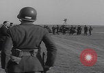 Image of Boys salute 101st Airborne Mourmelon le Grand France, 1945, second 54 stock footage video 65675080001