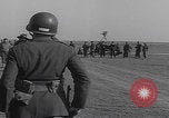 Image of Boys salute 101st Airborne Mourmelon le Grand France, 1945, second 56 stock footage video 65675080001