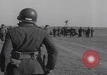 Image of Boys salute 101st Airborne Mourmelon le Grand France, 1945, second 57 stock footage video 65675080001