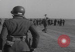 Image of Boys salute 101st Airborne Mourmelon le Grand France, 1945, second 58 stock footage video 65675080001