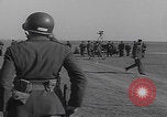 Image of Boys salute 101st Airborne Mourmelon le Grand France, 1945, second 59 stock footage video 65675080001