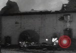 Image of Wingene Belgium burning houses Wingene Belgium, 1945, second 39 stock footage video 65675080008