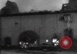 Image of Wingene Belgium burning houses Wingene Belgium, 1945, second 42 stock footage video 65675080008