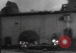 Image of Wingene Belgium burning houses Wingene Belgium, 1945, second 43 stock footage video 65675080008