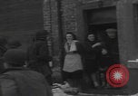 Image of 347th Regiment Troops give cigarette Saint Hubert Belgium, 1945, second 4 stock footage video 65675080015