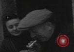 Image of 347th Regiment Troops give cigarette Saint Hubert Belgium, 1945, second 14 stock footage video 65675080015