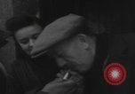 Image of 347th Regiment Troops give cigarette Saint Hubert Belgium, 1945, second 16 stock footage video 65675080015