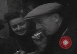 Image of 347th Regiment Troops give cigarette Saint Hubert Belgium, 1945, second 18 stock footage video 65675080015
