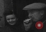 Image of 347th Regiment Troops give cigarette Saint Hubert Belgium, 1945, second 19 stock footage video 65675080015