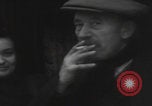 Image of 347th Regiment Troops give cigarette Saint Hubert Belgium, 1945, second 20 stock footage video 65675080015