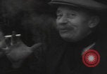 Image of 347th Regiment Troops give cigarette Saint Hubert Belgium, 1945, second 22 stock footage video 65675080015