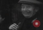 Image of 347th Regiment Troops give cigarette Saint Hubert Belgium, 1945, second 23 stock footage video 65675080015