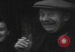 Image of 347th Regiment Troops give cigarette Saint Hubert Belgium, 1945, second 24 stock footage video 65675080015