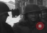 Image of 347th Regiment Troops give cigarette Saint Hubert Belgium, 1945, second 25 stock footage video 65675080015
