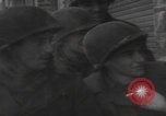 Image of 347th Regiment Troops give cigarette Saint Hubert Belgium, 1945, second 31 stock footage video 65675080015