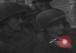 Image of 347th Regiment Troops give cigarette Saint Hubert Belgium, 1945, second 32 stock footage video 65675080015
