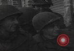 Image of 347th Regiment Troops give cigarette Saint Hubert Belgium, 1945, second 34 stock footage video 65675080015
