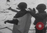 Image of US soldier winter snow capes Vossenack Germany, 1945, second 27 stock footage video 65675080047